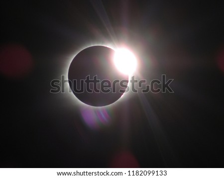 Diamond ring phenomenon occurring at the end of totality during the 2017 Great American Solar Eclipse. Photo taken in southern Illinois. 