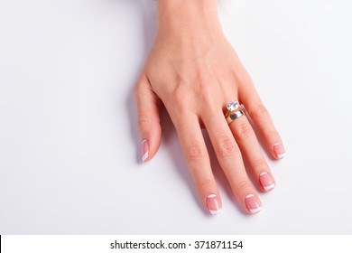 Diamond Ring And Wedding Ring On Woman's Finger. Beautiful Moon French Manicure.
