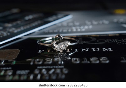 Diamond ring is white gold decorated with diamonds. placed credit cardRecorded 14July 2023Rayong, Thailand. - Shutterstock ID 2332288435