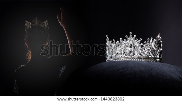 Diamond Silver Crown for Miss Pageant Beauty\
Contest, Crystal Tiara jewelry decorated gems stone and abstract\
dark background on black velvet fabric cloth, Macro photography\
copy space for text\
logo