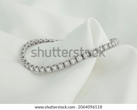 diamond tennis bracelet with gold and luxury materials