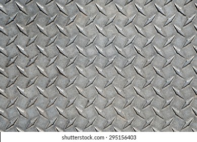 Diamond Tread Plate. Picture Of Dirty And Heavily Worn Metal Diamond Tread Plate.