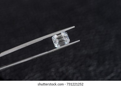Diamond in tweezers