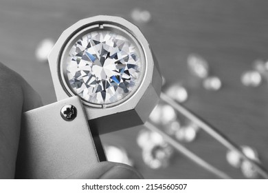 Diamond Viewed Under Magnifying Lens. Jewellers Loupe with Diamond. Selective Focus. 