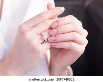 Diamond wedding ring on woman hand - Shutterstock ID 2097748801