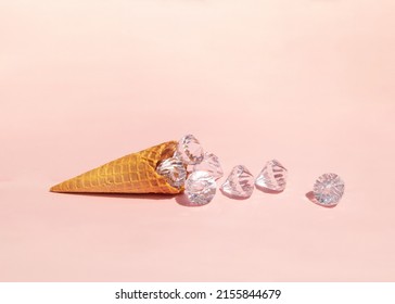 Diamonds In Ice Cream Cone On Light Pastel Pink Background. Creative Food Concept. Minimalistic Rich Flavor Composition. Sunny Summer Idea.