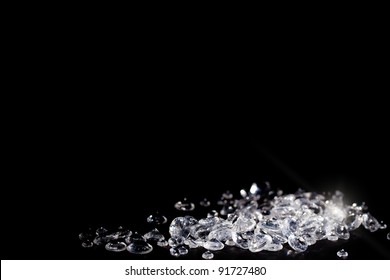 Diamonds on a black background with copy space