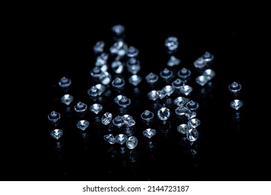 Diamonds on a black reflective back ground