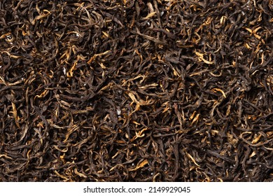Dian Hong, black tea on white background. Top view. Close up. High resolution