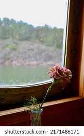 Dianthus In A Vase In An Old Steamship Boat