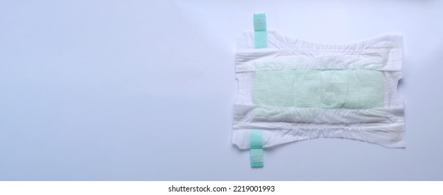 Diaper Open Type For Baby Isolated White Background And Copy Space. Baby Diaper Dry And Soft Texture Fabric White Color Hygienic And Comfortable Tape Type And White Background Studio Shot