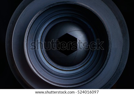 The diaphragm of a camera lens aperture, focus with goal target setting for center hitting on focus in the target center