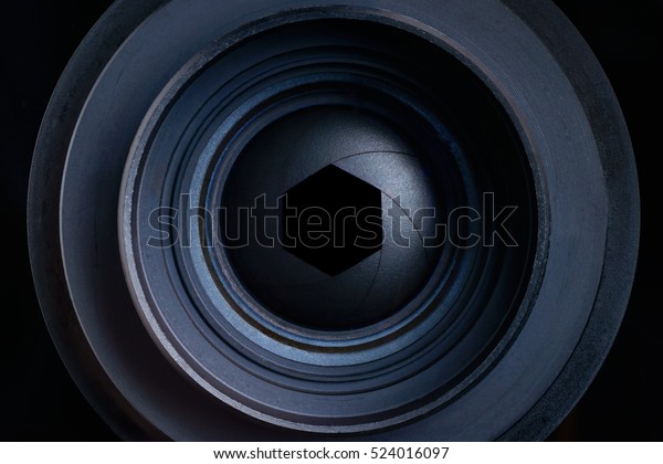 The
diaphragm of a camera lens aperture, focus with goal target setting
for center hitting on focus in the target
center