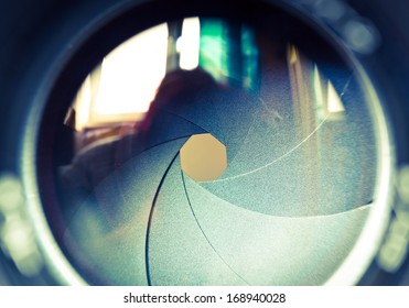  The Diaphragm Of A Camera Lens Aperture. Selective Focus With Shallow Depth Of Field. Color Toned Image.