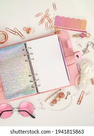 Diary Opens With White And Holographic Page. Pink Planner With Cute Stationery Photographing In Flatlay Style. Top View Of Pink Planner With Business Stationery. Pink Glamour Planner Decoration Photo