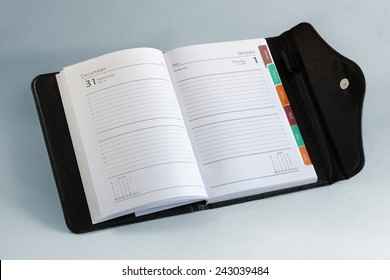 Diary or personal organizer planner open to blank page - Shutterstock ID 243039484