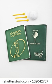 Diary And Rules Of Golf With Ball And Tees