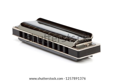 Diatonic harmonica isolated on a white background.