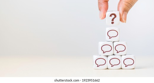 Dice Cube With Question Mark And Speech Bubbles Comment Icon On Table.FAQ( Frequency Asked Questions), Answer, QA, Admin, Communication, Comments In Social Networks.messenger, SMS, Feedback. Leader.