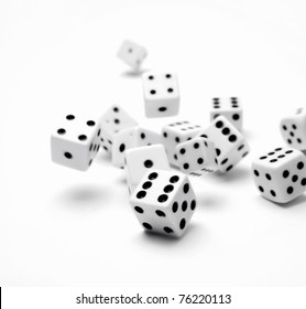 Dice Rolling On Plain Background