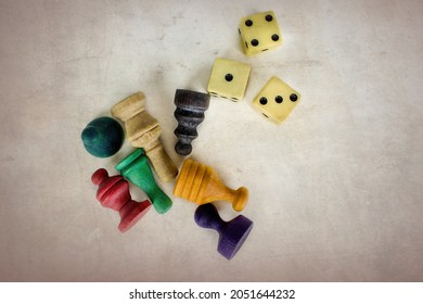 Dice And Wooden Game Pieces