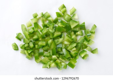 Diced Green Bell Pepper / Capsicum In White Background