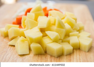 diced potatoes on a cutting board
