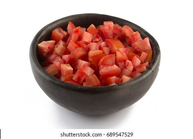 Diced Tomatoes Into A Bowl Isolated On White Background