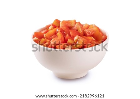 Diced tomatoes in white bowl isolated on white background.