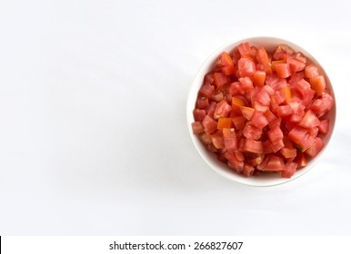 Diced Tomatoes In White Cup On White Background