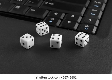 Dices with computer keyboard. Concept of internet casino
