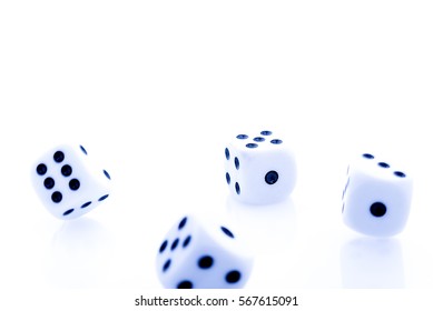 dices during a roll - with a blue hue