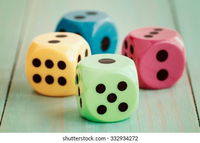 Dices On Wooden Floor In Vintage Color Tone. Abstract Background To Risk Management Concept