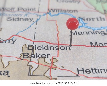 Dickinson, North Dakota marked by a red map tack.  The City of Dickinson is the county seat of Stark County, ND.
