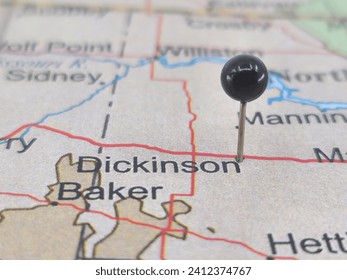 Dickinson, North Dakota marked by a black map tack.  The City of Dickinson is the county seat of Stark County, ND.