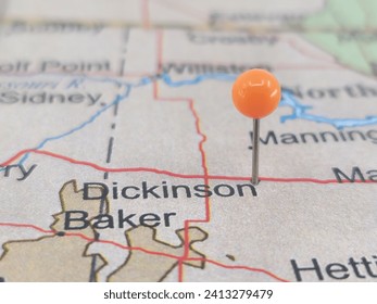 Dickinson, North Dakota marked by an orange map tack.  The City of Dickinson is the county seat of Stark County, ND.