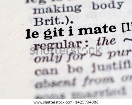 Dictionary definition of word legitimate. Selective focus.