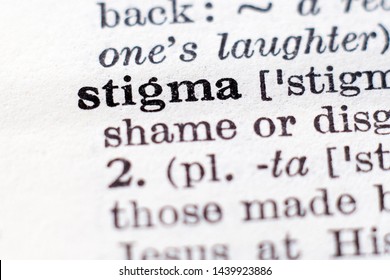 Dictionary definition of word Stigma, selective focus.