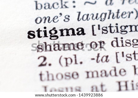 Dictionary definition of word Stigma, selective focus.