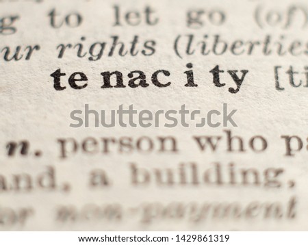 Dictionary definition of word tenacity, selective focus.