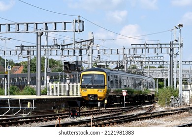 Didcot, Oxford, England - June 2021: Commuter Train Approaching Didcot Railway Station Centre. 