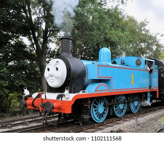 DIDCOT, OXFORDSHIRE, UK - OCTOBER 5, 2013. Thomas The Tank Engine Is A Live Steam Engine Character, Based On The Books By Reverend Wilbert Awdry, Running At Didcot Railway Centre, Oxfordshire, UK.