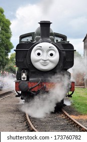 DIDCOT, UK -Ã?Â� OCTOBER 5. A Live Steam Locomotive Bearing The Face Of Thomas The Tank Engine Based On Stories By Wilbert Awdry, Running On October 5, 2013 At Didcot Railway Centre, Oxfordshire, UK. 