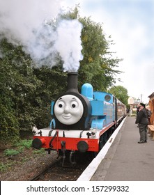 DIDCOT, UK - OCTOBER 5. Thomas The Tank Engine Is A Live Steam Locomotive, Based On Books By The Reverend Wilbert Awdry, Running On October 5, 2013 At Didcot Railway Centre, Oxfordshire, UK. 