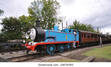 DIDCOT, UK - OCTOBER 5. Thomas The Tank Engine Is A Live Steam Engine, Based On Books For Children By Rev Wilbert Awdry, Running On October 5, 2013 Running At Didcot Railway Centre, Oxfordshire, UK. 