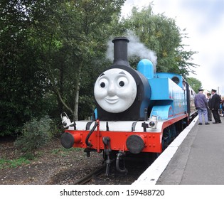 DIDCOT, UK - OCTOBER 5. Thomas The Tank Engine Is A Live Steam Engine, Based On Stories For Children By Wilbert Awdry, At The Station On October 5, 2013, In Didcot Railway Centre, Oxfordshire, UK. 