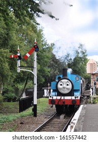 DIDCOT, UK -Â� OCTOBER 5. Thomas The Tank Engine Is A Live Steam Engine, Based On Stories By Wilbert Awdry, Arriving At The Station On October 5, 2013 At Didcot Railway Centre, Oxfordshire, UK. 