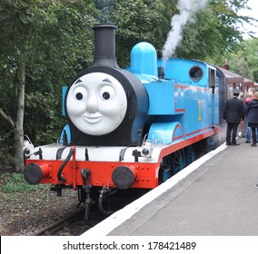 DIDCOT, UK - OCTOBER 5. Thomas The Tank Engine Is A Live Steam Engine, Based On Books By The Reverend Wilbert Awdry, Running On October 5, 2013 At Didcot Railway Centre, Oxfordshire, England, UK. 