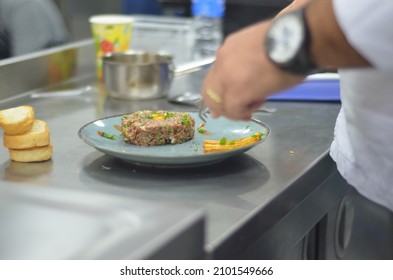 Didim, Turkey - January 05, 2022: The Hand Of A Person Who Is Taking Food. Someone Is Eating Fried Meatball