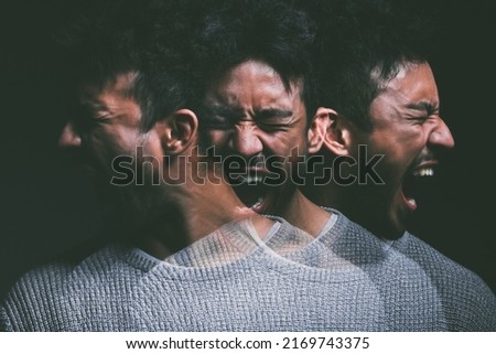 I didnt believe in monsters until my mind created them. Studio shot of a young man experiencing mental anguish and screaming against a black background.